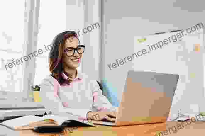 A Person Working On A Laptop At A Desk In An Office. Selection Criteria Mastery: Beginners Simple Guide To Government Accounting Job Paying $85 000 Or More