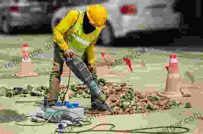 Image Of A Worker Operating Heavy Machinery At A Pavement Construction Site An To Materials Production And Mixing For Portland Cement Pavement (Street And Highway Engineering)